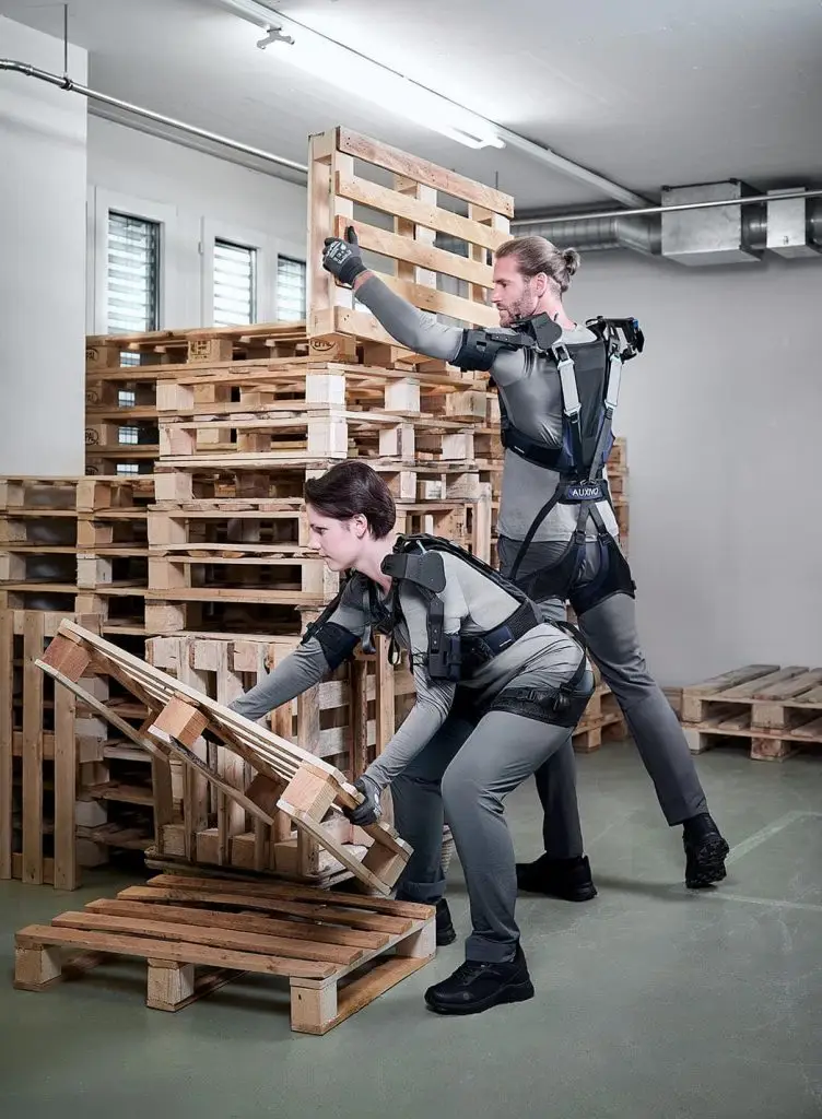 The OmniSuit® by Auxivo AG is an integrated shoulder and back assistive device designed to support workers engaged in overhead, lifting, and forward-leaning tasks.